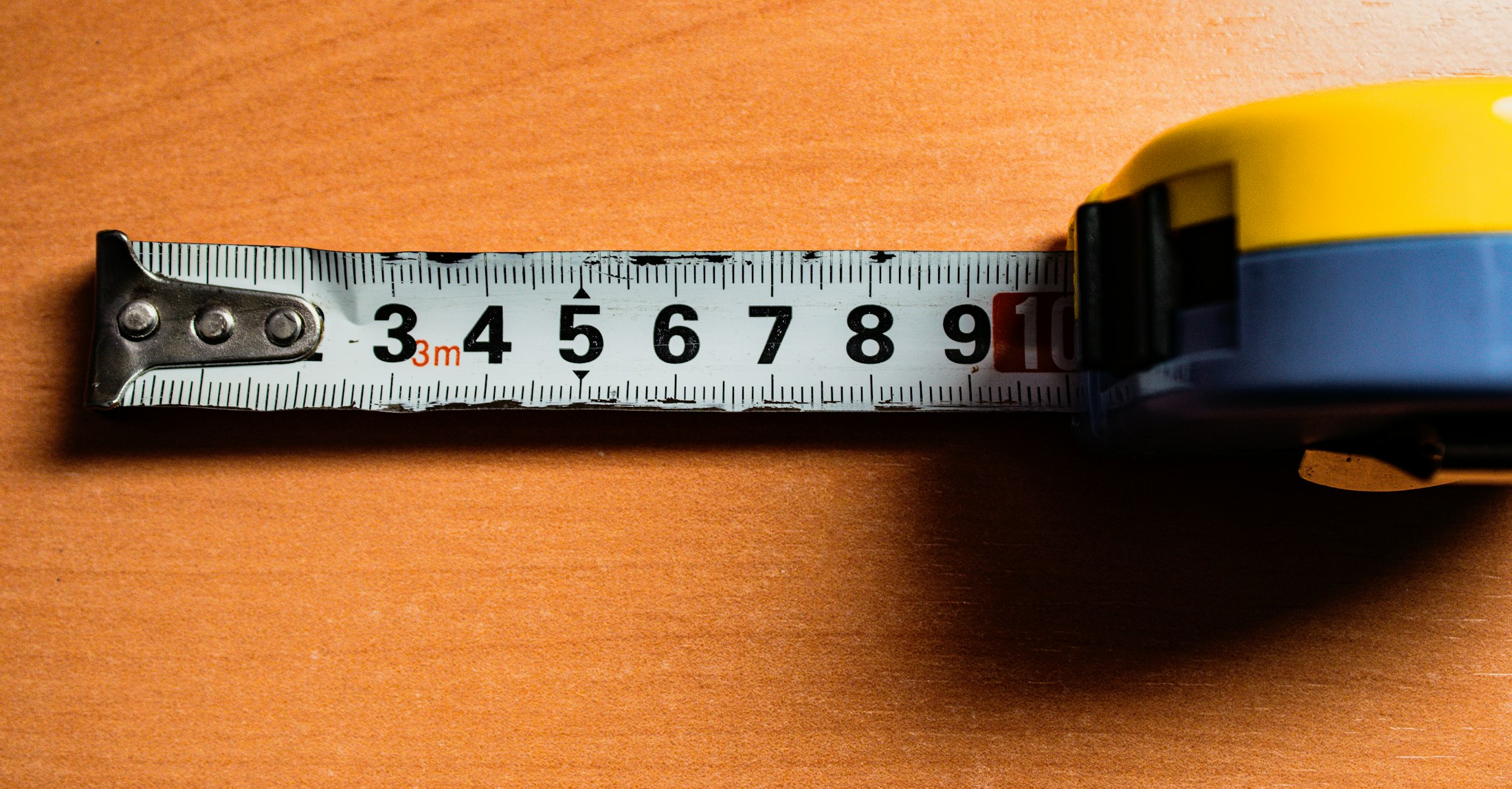 Tape measure on timber — on-site measurements and readings
